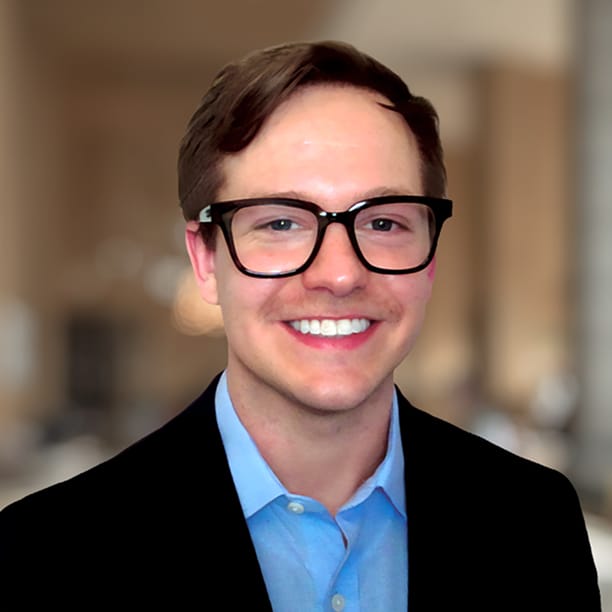 Professional headshot of Greg Tolliver
