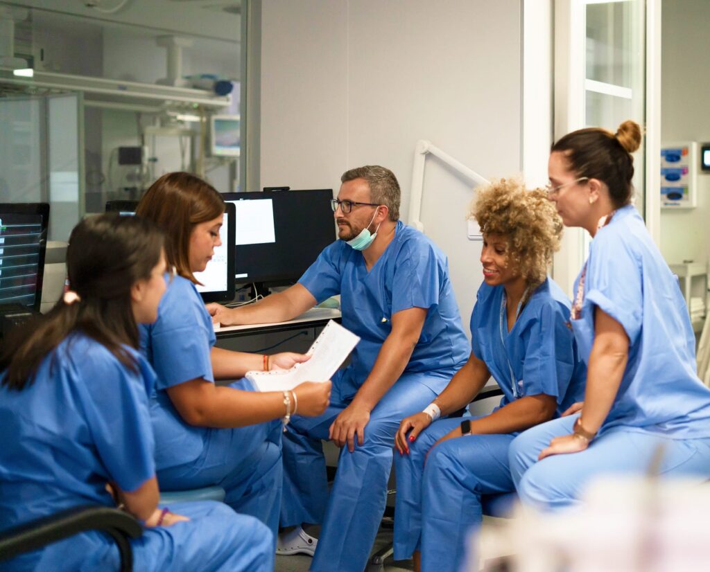 Group of nurses collaborating in a healthcare office setting